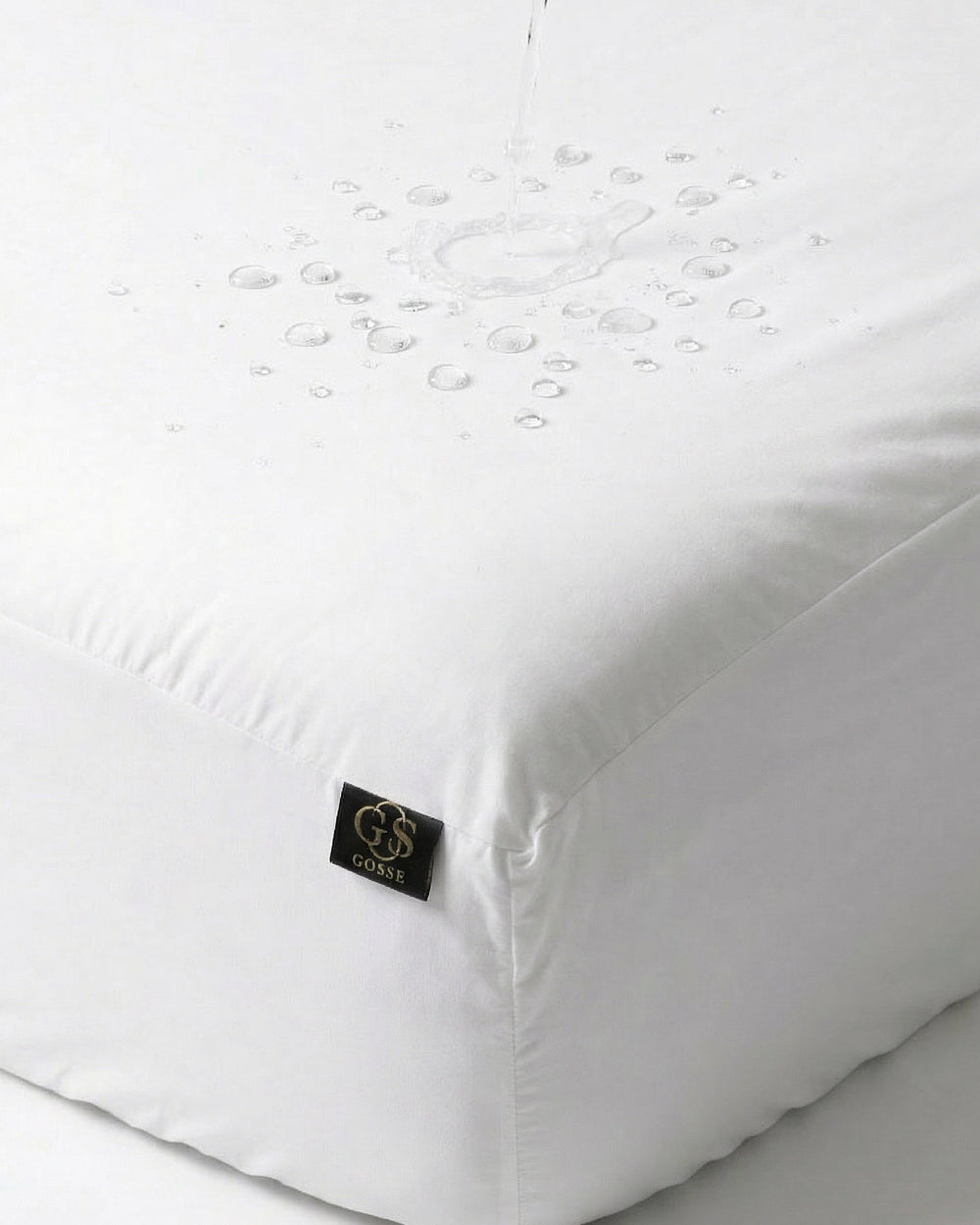 White mattress cover with a brand logo on a white background